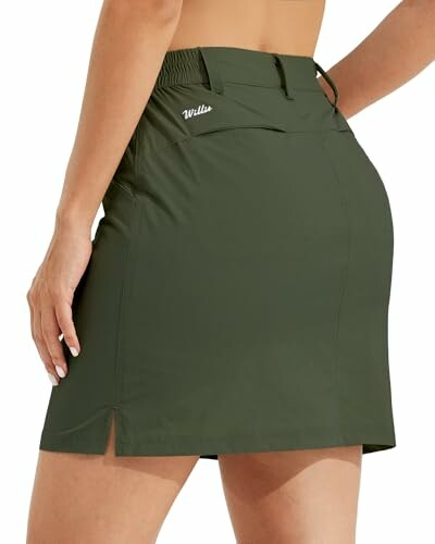 Woman wearing green tennis skirt